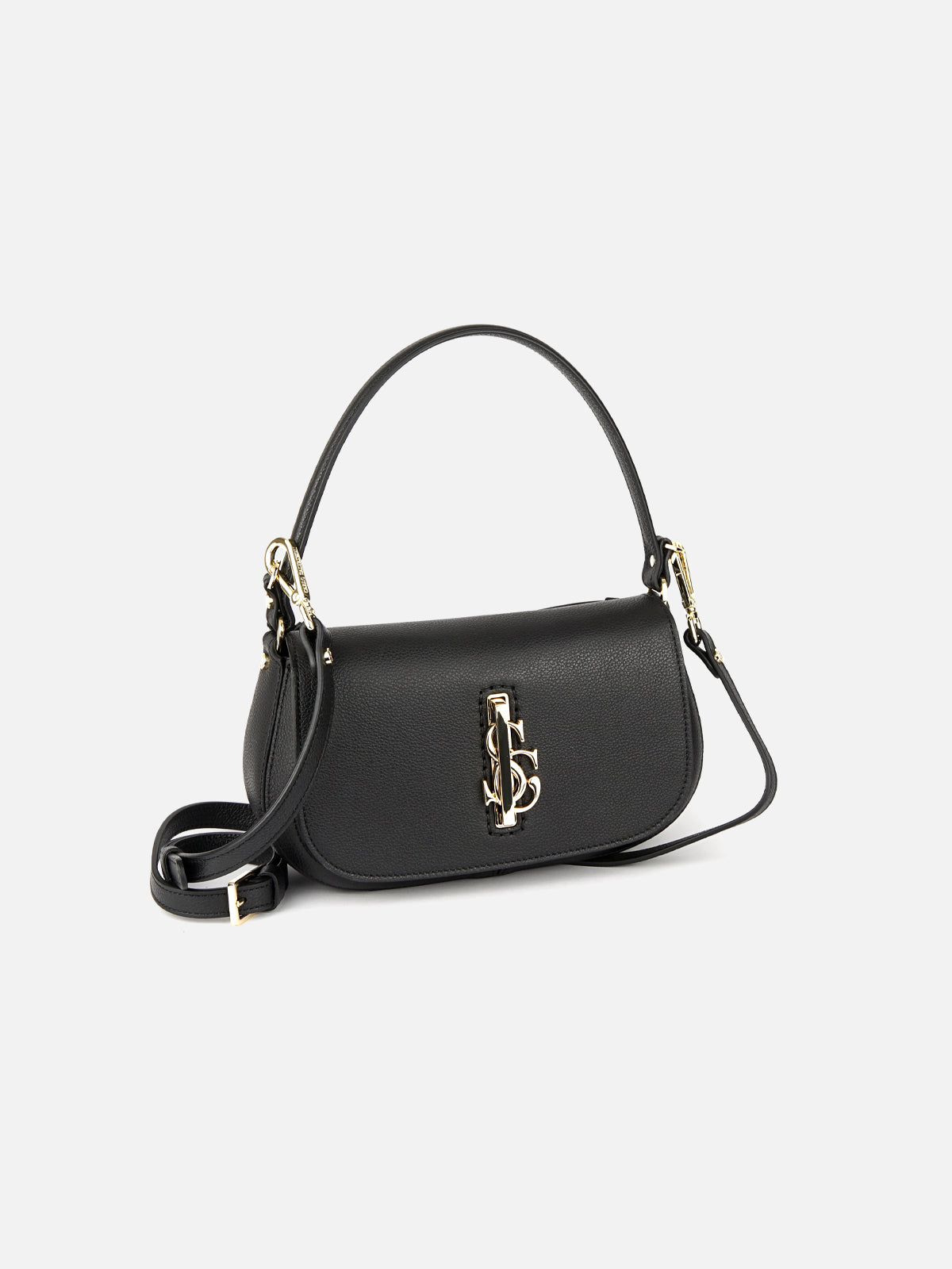 A black pebbled leather handbag, positioned at a three-quarter angle on a neutral, off-white studio background. The bag features a curved flap closure with a prominent gold-toned metal interlocking 'C' and 'S' logo clasp. It has a short top-handle strap and a long, adjustable shoulder strap that extends to the side. The edges are finished with a black trim, and the hardware is polished gold. The lighting is soft and even.