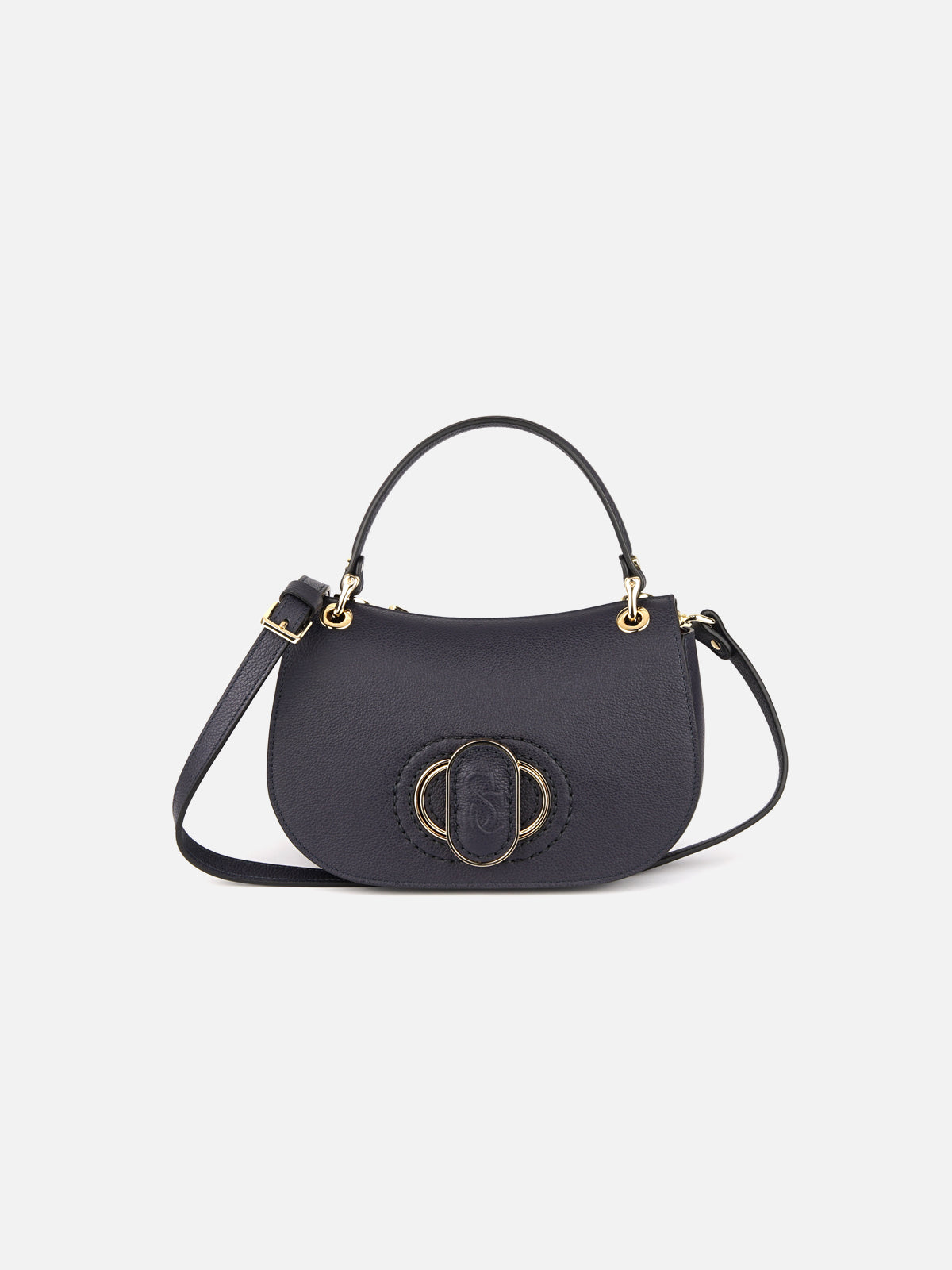 Front-facing studio shot of a dark navy blue leather handbag with a rounded, semicircular shape. It has a single rolled top handle and a detachable, adjustable shoulder strap on the left. The front flap closure features a central decorative element: an oval gold-toned frame surrounding a matching leather section with an embossed interlocking 'CS' monogram.
