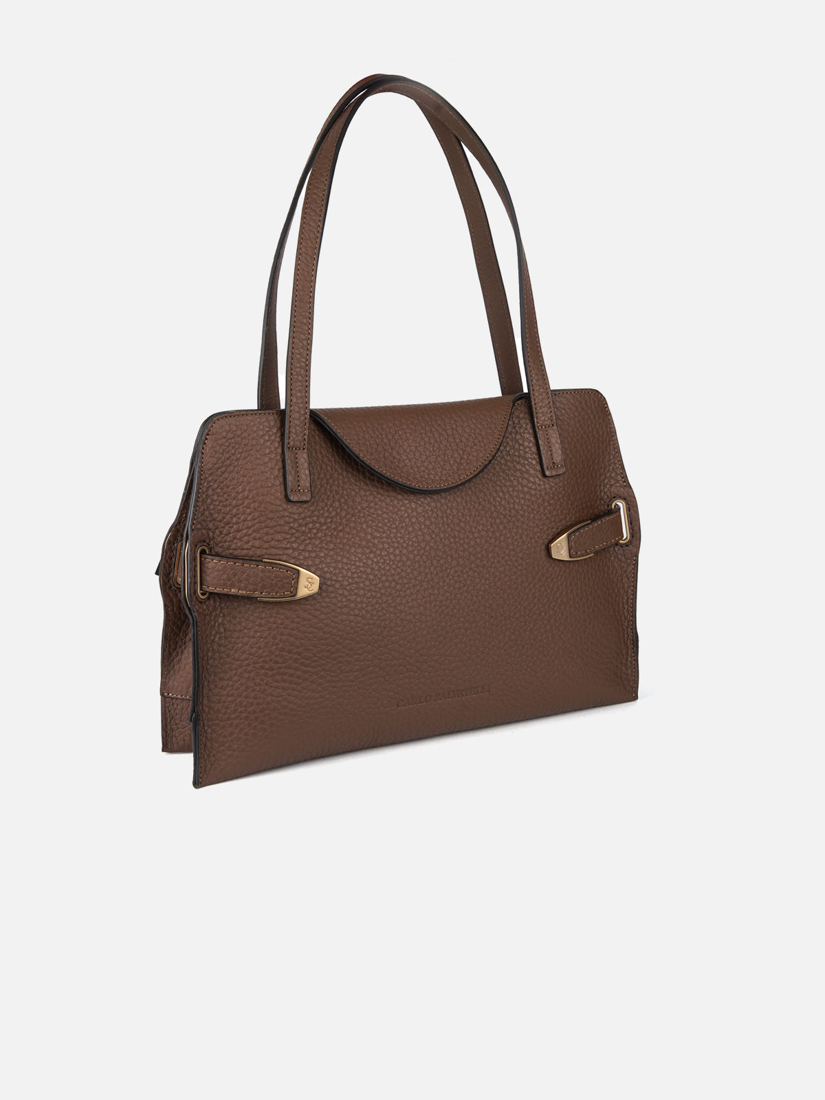 A three-quarter view of a brown pebbled-leather tote bag featuring double shoulder handles and a curved top opening trim. Side leather accent straps are finished with engraved gold-tone metal hardware tips, set against a plain light grey background.